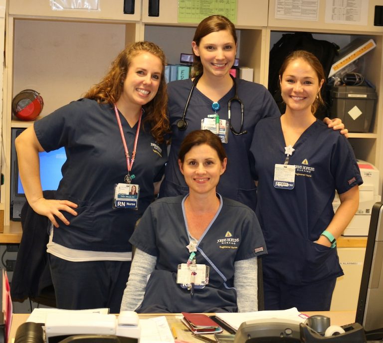 Nadya (left) with fellow nurses at Johns Hopkins Bayview Medical Center in Baltimore, Maryland.